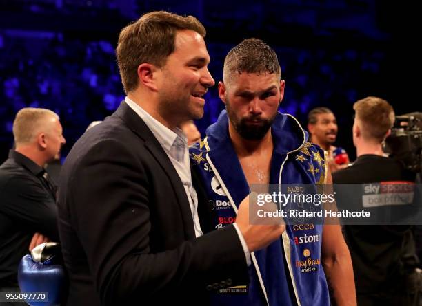 Eddie Hearn and Tony Bellew celebrate victory after Heavyweight fight between Tony Bellew and David Haye at The O2 Arena on May 5, 2018 in London,...