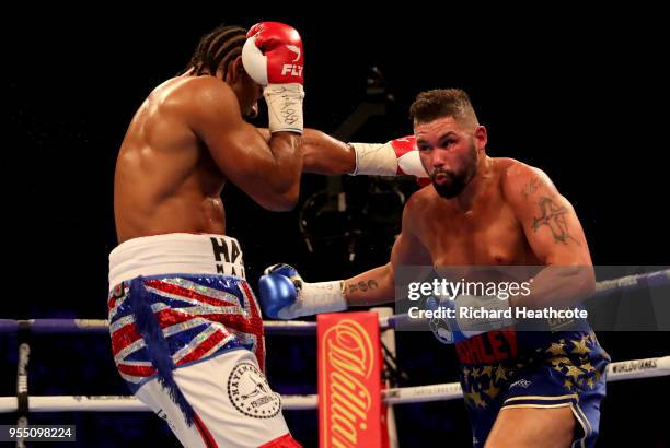 David Haye punches Tony Bellew during Heavyweight fight between Tony Bellew and David Haye at The O2 Arena on May 5, 2018 in London, England.