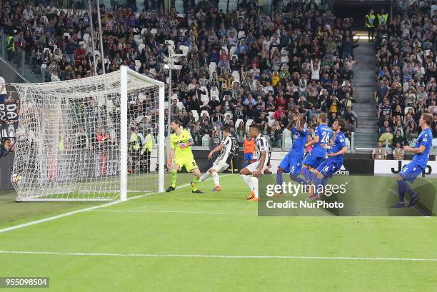 Sebastien De Maio realizes an own goal during the Serie A football match between Juventus FC and Bologna FC at Allianz Stadium on May 05, 2018 in...