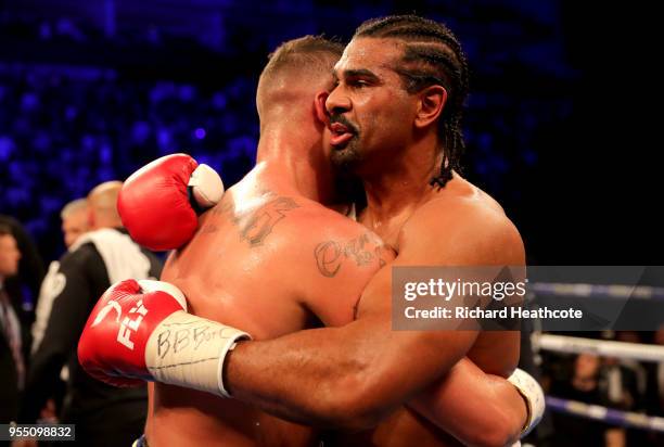 David Haye and Tony Bellew embrace after Heavyweight fight between Tony Bellew and David Haye at The O2 Arena on May 5, 2018 in London, England.