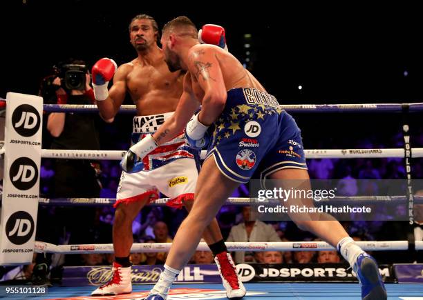 Tony Bellew punches David Haye during Heavyweight fight between Tony Bellew and David Haye at The O2 Arena on May 5, 2018 in London, England.