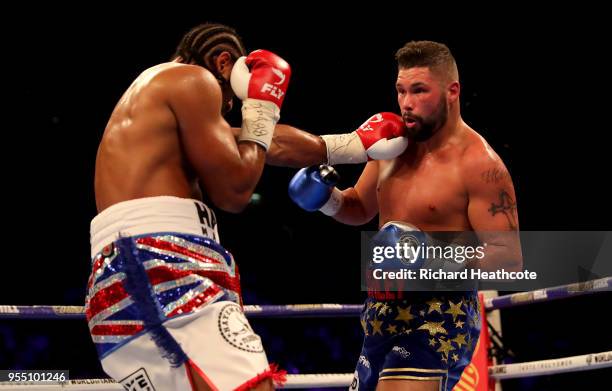 David Haye punches Tony Bellew during Heavyweight fight between Tony Bellew and David Haye at The O2 Arena on May 5, 2018 in London, England.