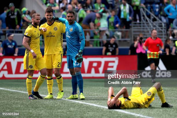 The Columbus Crew celebrate their 0-0 draw to the Seattle Sounders during their game at CenturyLink Field on May 5, 2018 in Seattle, Washington.