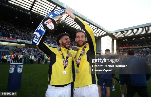 Blackburn Rovers' Derrick Williams and Blackburn Rovers' Charlie Mulgrew celebrate at the end of todays match during the Sky Bet League One match...