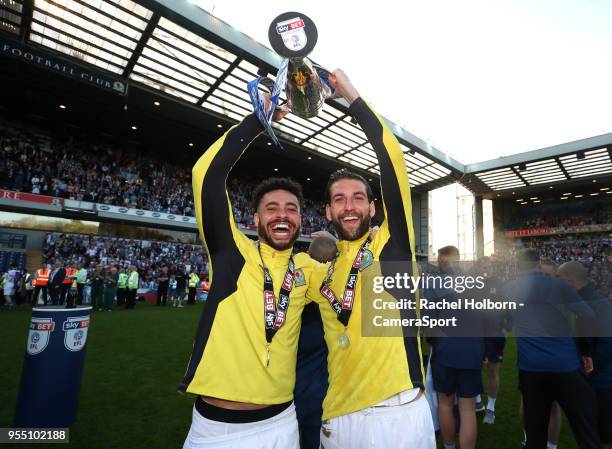 Blackburn Rovers' Derrick Williams and Blackburn Rovers' Charlie Mulgrew celebrate at the end of todays match during the Sky Bet League One match...