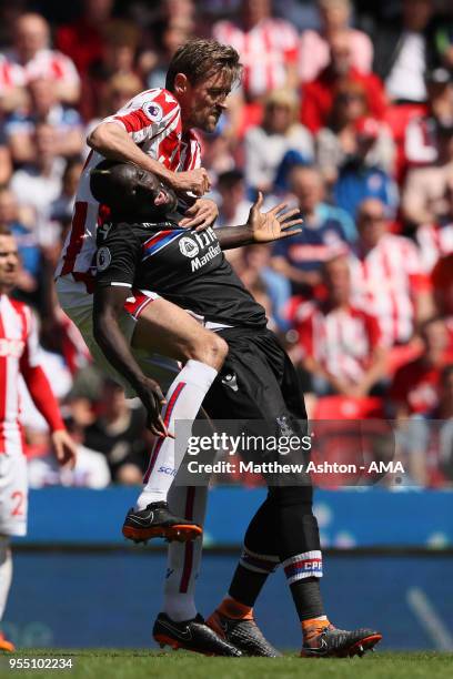 Peter Crouch of Stoke City and Mamadou Sakho of Crystal Palace during the Premier League match between Stoke City and Crystal Palace at Bet365...