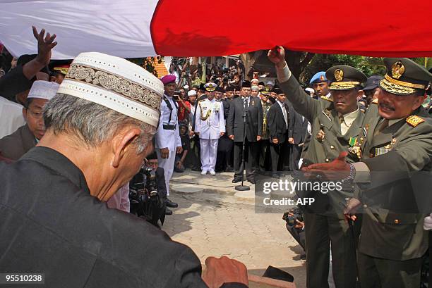 Indonesian President Susilo Bambang Yudhoyono leads a ceremony during the funeral of late former Indonesian president Abdurrahman Wahid, also known...