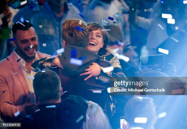 Marie Wegener, winner of 'Deutschland sucht den Superstar', hugs Dieter Bohlen, during the finals of the tv competition 'Deutschland sucht den...