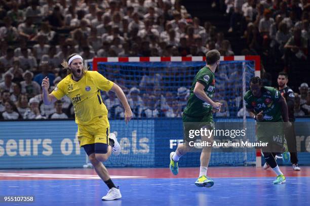 Mikkel Hansen of Paris Saint-Germain reacts after scoring during the Handball French Cup Final match between Nimes and Paris Saint Germain at...