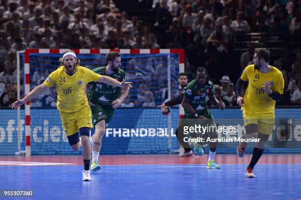 Mikkel Hansen of Paris Saint-Germain reacts after scoring during the Handball French Cup Final match between Nimes and Paris Saint Germain at...
