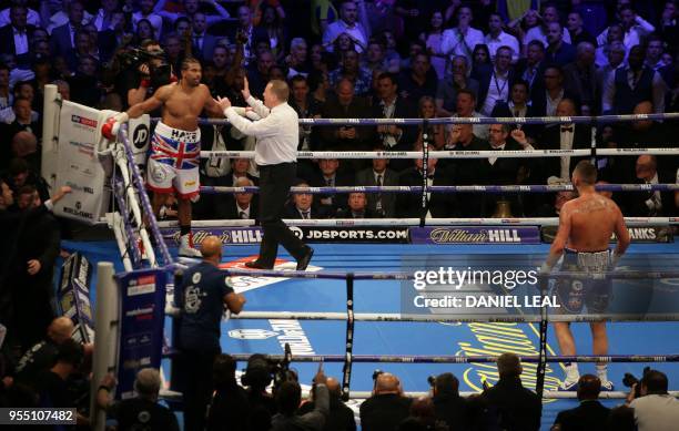 The referee stops the bout in the fifth round between British boxer David Haye and countryman Tony Bellew during their heavyweight rematch at the O2...