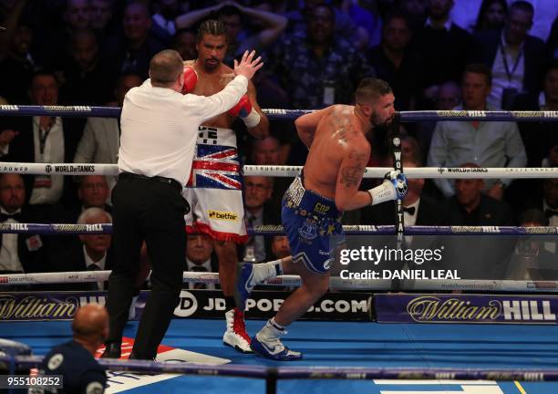 The referee stops the fight between British boxers David Haye and Tony Bellew before awarding the victory to Bellew in their heavyweight rematch at...