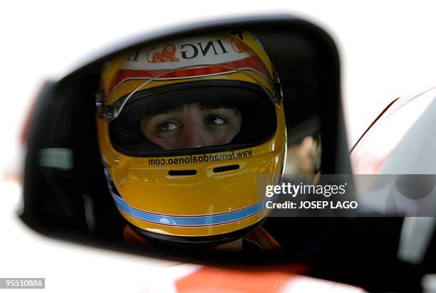 Renault's Formula 1 Spanish driver Fernando Alonso during an ecodriven session at the Catalunya race track in Montmelo, on the outskirts of...