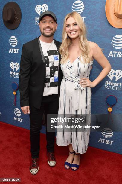 Cody Alan and Marley Sherwood arrive at the 2018 iHeartCountry Festival By AT&T at The Frank Erwin Center on May 5, 2018 in Austin, Texas.