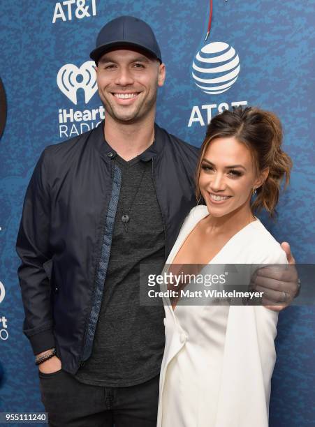 Mike Caussin and Jana Kramer arrive at the 2018 iHeartCountry Festival By AT&T at The Frank Erwin Center on May 5, 2018 in Austin, Texas.