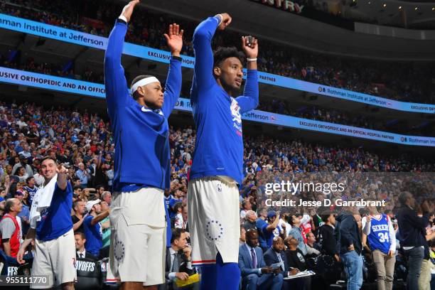 May 5: Justin Anderson and Robert Covington of the Philadelphia 76ers react against the Boston Celtics during Game Three of the Eastern Conference...