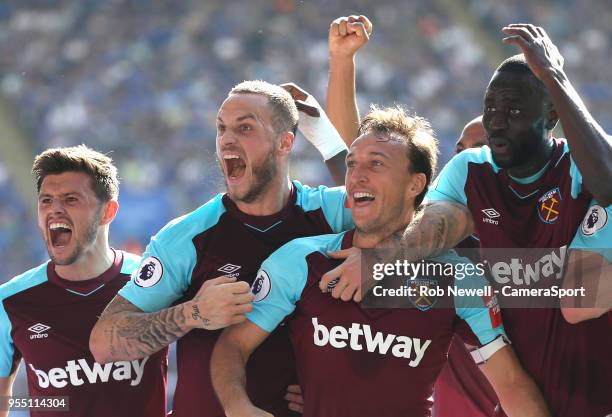 West Ham United's Mark Noble celebrates scoring his side's second goal during the Premier League match between Leicester City and West Ham United at...