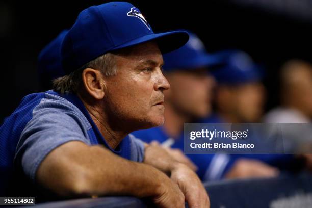 Manager John Gibbons of the Toronto Blue Jays looks on from the dugout during the fourth inning of a game against the Tampa Bay Rays on May 5, 2018...