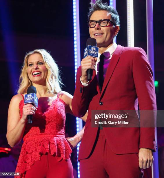 Hosts Candace Cameron Bure and Bobby Bones speak onstage during the 2018 iHeartCountry Festival By AT&T at The Frank Erwin Center on May 5, 2018 in...