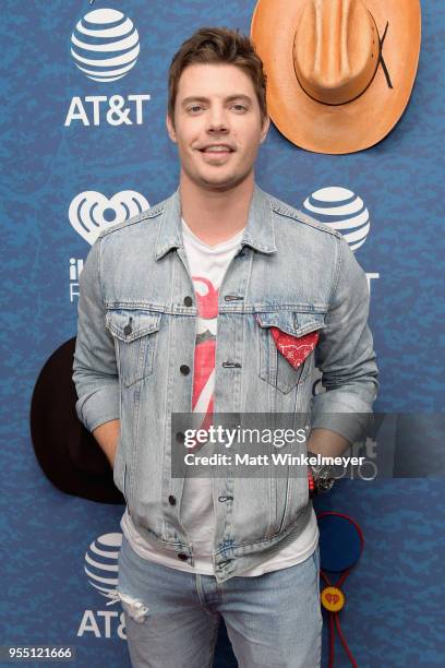 Josh Henderson arrives at the 2018 iHeartCountry Festival By AT&T at The Frank Erwin Center on May 5, 2018 in Austin, Texas.