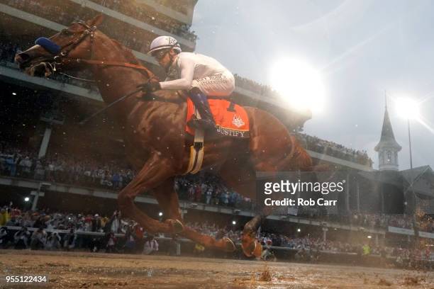Justify, ridden by jockey Mike Smith crosses the finish line to win the 144th running of the Kentucky Derby at Churchill Downs on May 5, 2018 in...
