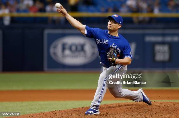 Pitcher Seung Hwan Oh of the Toronto Blue Jays pitches during the seventh inning of a game against the Tampa Bay Rays on May 5, 2018 at Tropicana...