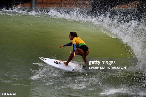 Taina Hinckel of Brazil comes out of a barrel during round one of the WSL Founders' Cup of Surfing, at the Kelly Slater Surf Ranch in Lemoore,...