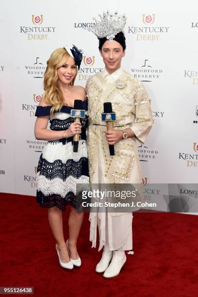 American figure skaters Tara Lipinski and Johnny Weir attends The 144th Annual Kentucky Derby at Churchill Downs on May 5, 2018 in Louisville,...