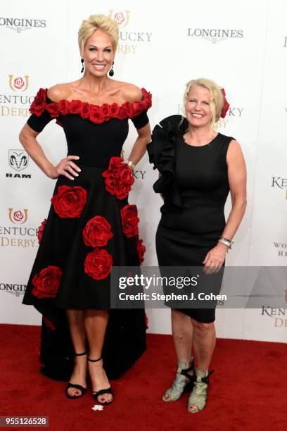 Shannon Burton wears the Derby Rose Dress sponsored by the Churchill Down Foundation made by Amy Streeter during The 144th Annual Kentucky Derby at...