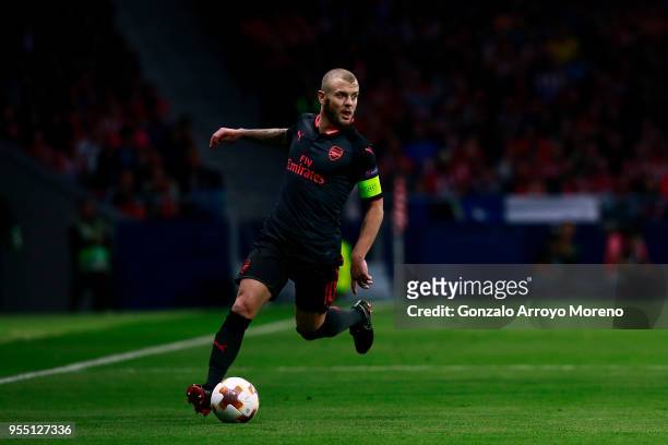 Jack Wilshere of Arsenal FC controls the ball during the UEFA Europa League Semi Final second leg match between Atletico Madrid and Arsenal FC at...