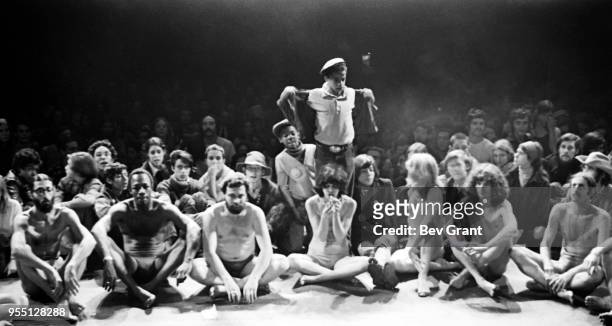 Members of the Living Theatre company, along with audience participants, perform 'Paradise Now' on stage at the Filmore East , New York, New York,...