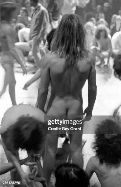 Members of the Living Theatre company, mostly naked, perform 'Paradise Now' on stage at the Filmore East , New York, New York, October 22 and 23,...