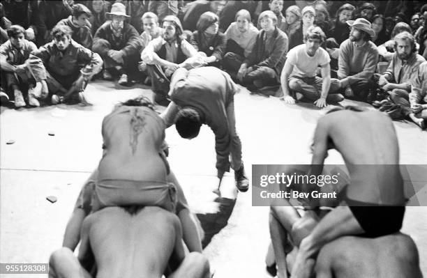 Members of the Living Theatre company, mostly naked, perform 'Paradise Now' on stage at the Filmore East , New York, New York, October 22 and 23,...