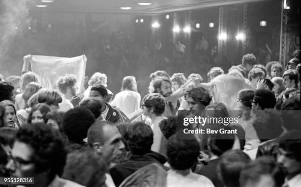 View of people at the Filmore East during the venue's takeover by anarchist groups, the Family and Up Against the Wall Motherfucker, New York, New...