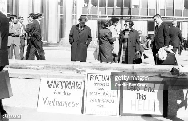 View of signs outside the Time Life Building during the Moratorium to End the War in Vietnam demonstration, New York, New York, October 15, 1969. The...