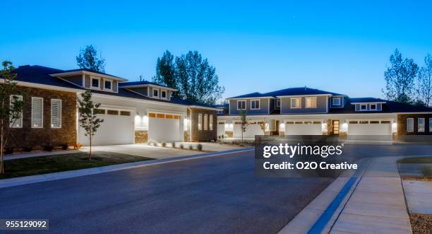 suburb houses at dusk - duplex stock pictures, royalty-free photos & images