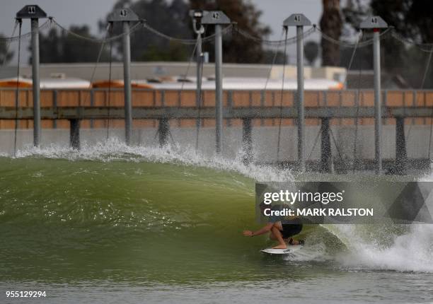 Mick Fanning of Australia in the tube during round two of the WSL Founders' Cup of Surfing at the Kelly Slater Surf Ranch in Lemoore, California on...
