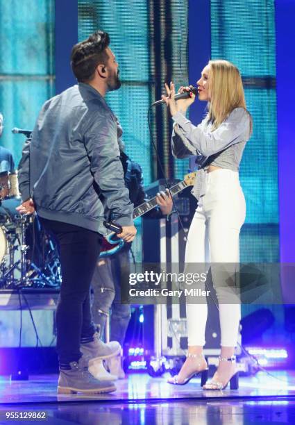 Shay Mooney of musical group Dan + Shay and Danielle Bradbery perform onstage during the 2018 iHeartCountry Festival By AT&T at The Frank Erwin...