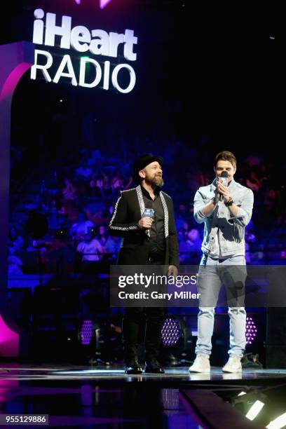 Kristian Bush of musical group Sugarland and Josh Henderson speak onstage during the 2018 iHeartCountry Festival By AT&T at The Frank Erwin Center on...