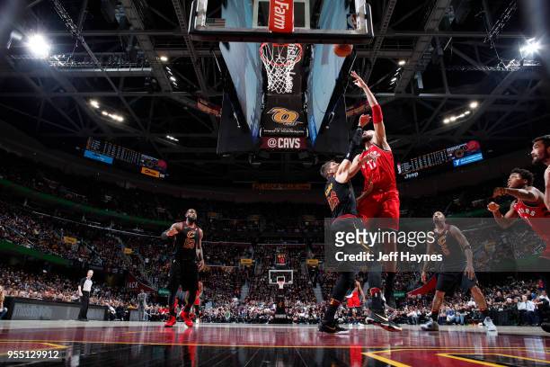 Jonas Valanciunas of the Toronto Raptors shoots the ball against the Cleveland Cavaliers during Game Three of the Eastern Conference Semi Finals of...