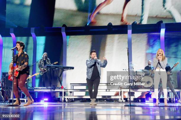 Dan Smyers and Shay Mooney of musical group Dan + Shay, and Danielle Bradbery perform onstage during the 2018 iHeartCountry Festival By AT&T at The...