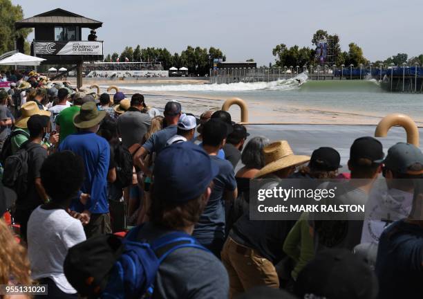 The crowd watches Jeremy Flores of France during round one of the WSL Founders' Cup of Surfing, at the Kelly Slater Surf Ranch in Lemoore, California...