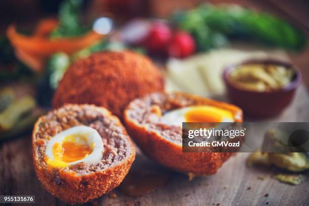 homemade british scotch eggs - scottish culture stock pictures, royalty-free photos & images