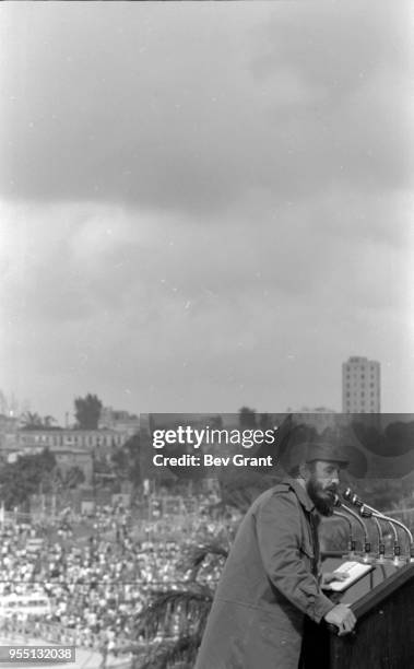 Cuban military and political leader Prime Minister Fidel Castro speaks from a podium in la Plaza de la Revolucion during the 10th anniversary...