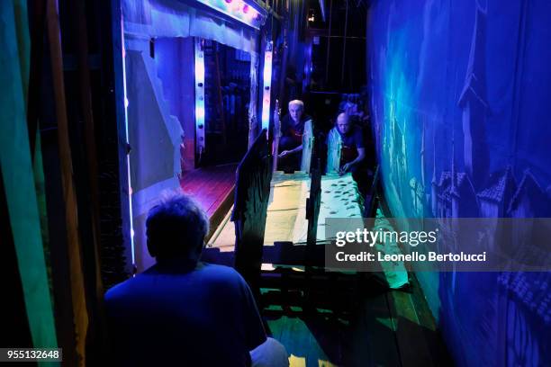 Moments of work behind the scenes during the show "Lamp of Aladdin" at the theater of the "Carlo Colla and Sons Marionette Company" on March 20, 2018...