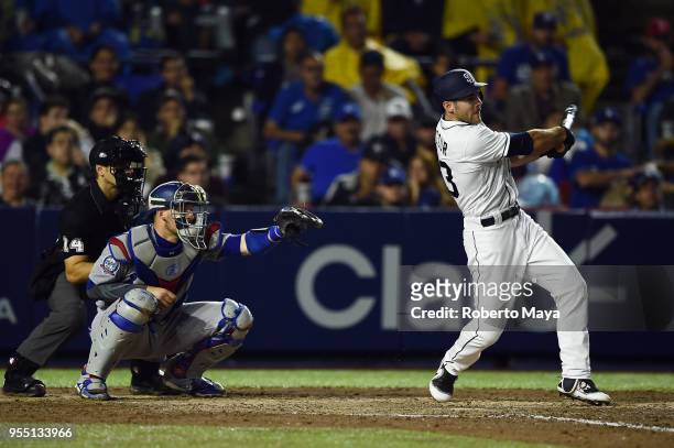 Matt Szczur of the San Diego Padres singles in the seventh inning during the game against the Los Angeles Dodgers at Estadio de Béisbol Monterrey on...