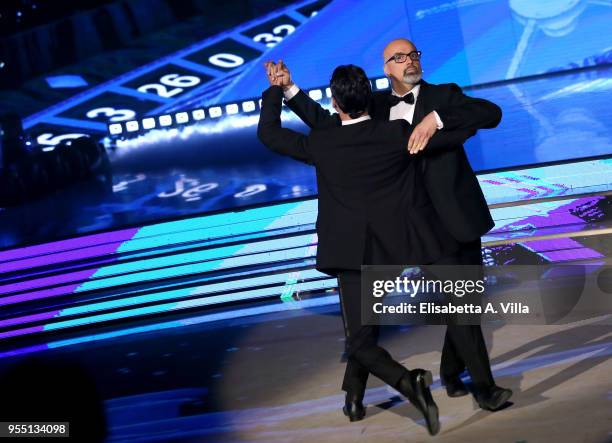 Italian beauty tutor Giovanni Ciacci and his dance partner Raimondo Todaro perform on the Italian TV show 'Ballando Con Le Stelle' at RAI Auditorium...