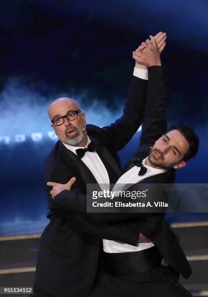 Italian beauty tutor Giovanni Ciacci and his dance partner Raimondo Todaro perform on the Italian TV show 'Ballando Con Le Stelle' at RAI Auditorium...
