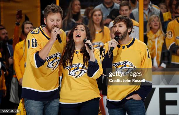 Country artists Lady Antebellum sings the National Anthem prior to Game Five of the Western Conference Second Round against the Winnipeg Jets during...