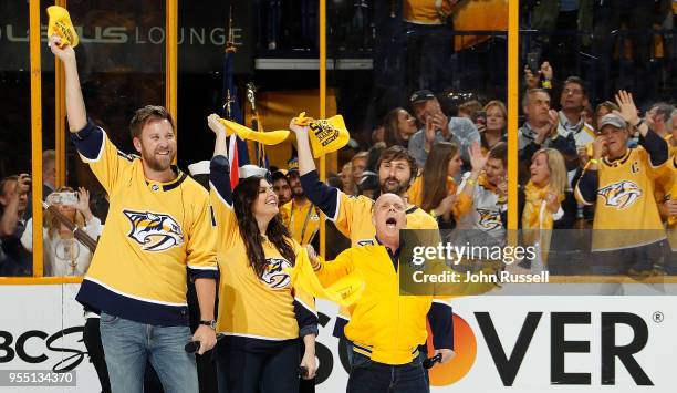 Scott Hamilton and Lady Antebellum wave the gold towel prior to Game Five of the Western Conference Second Round between the Nashville Predators and...